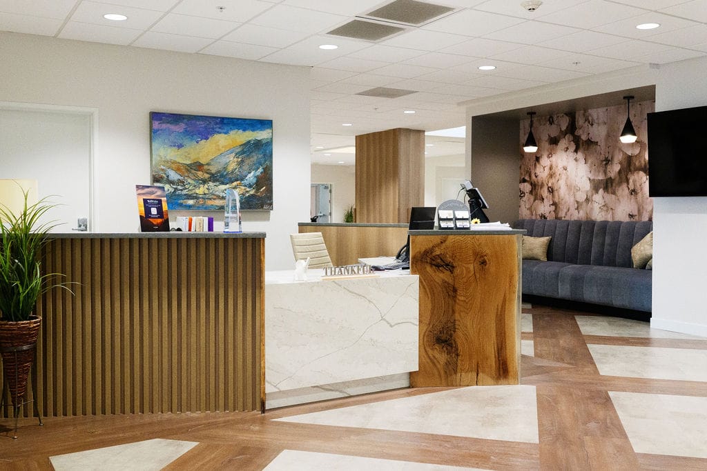 Reception desk and front lobby seating just inside the entrance